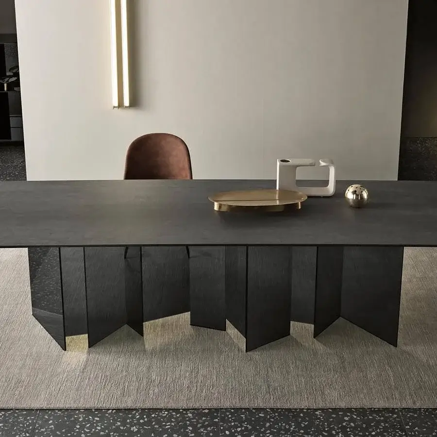 Distinguished Tonelli Design Metropolis table with a dark matte ceramic top and extra-clear staggered glass base