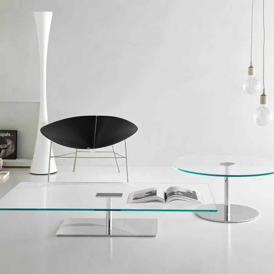 Distinctive Tonelli Design Farniente table with rectangular glass top and glossy metal base in blue-green tinted edges