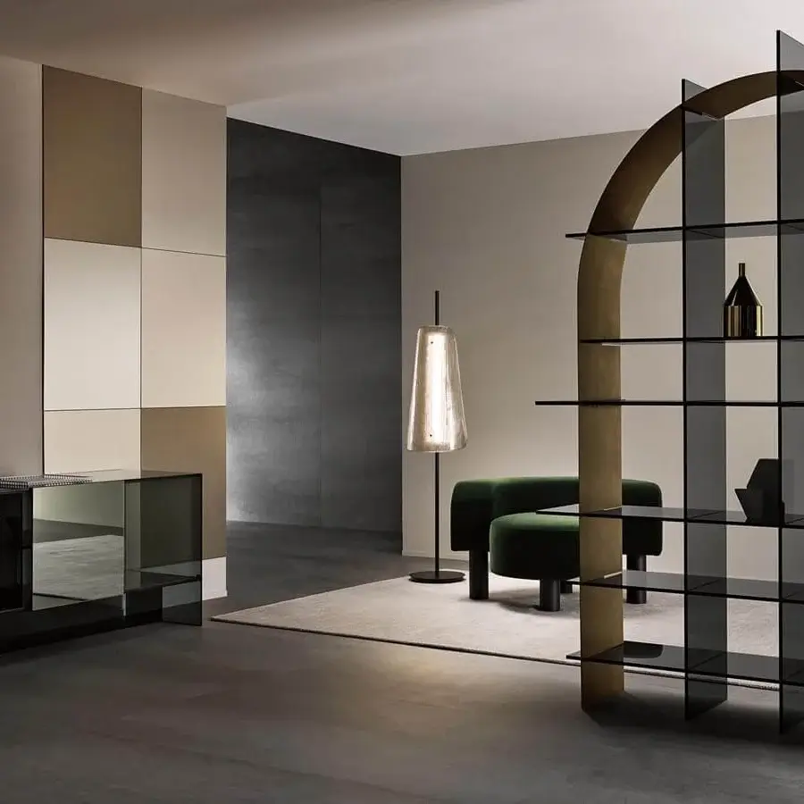 Exceptional Tonelli Design Paradigma bookcase with arched silhouette and brushed bronze metal sheet frame crafted in extra clear glass