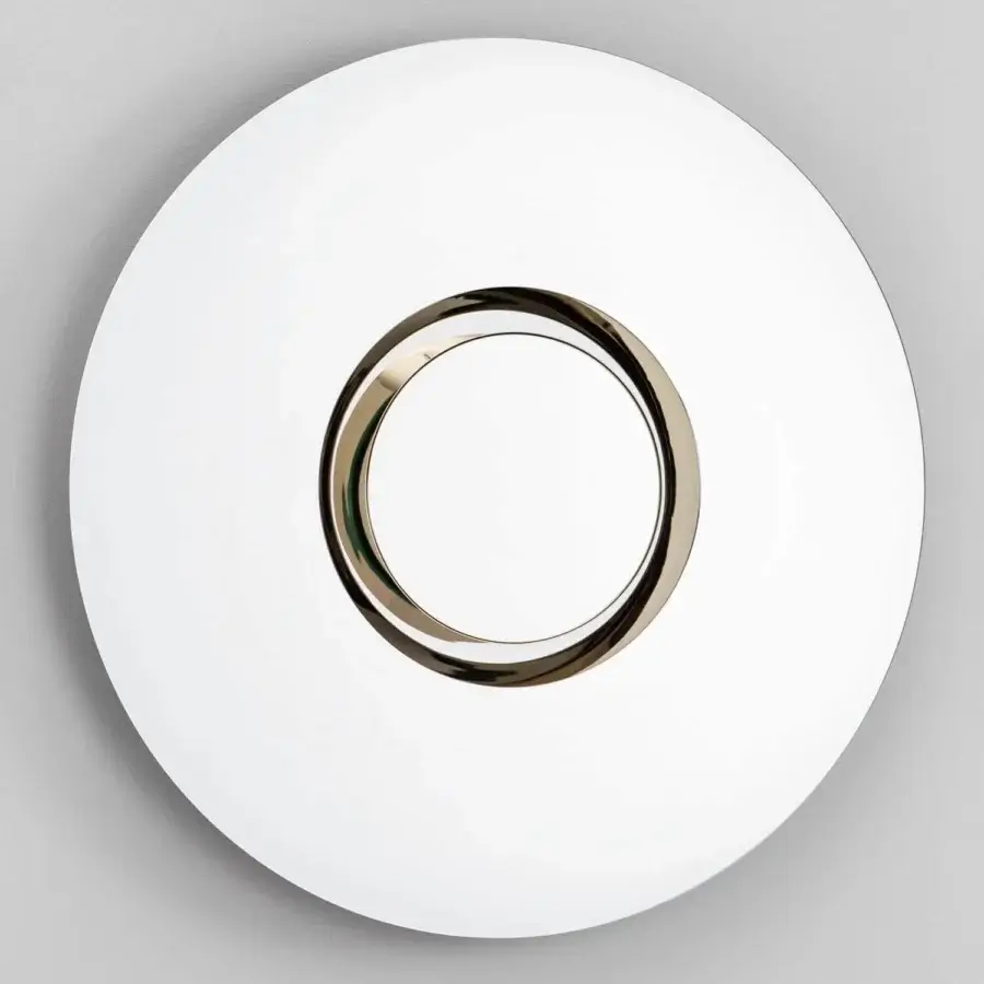 Distinguished Tonelli Design Ozma mirror with a circular form and bright white with gilded metal accents