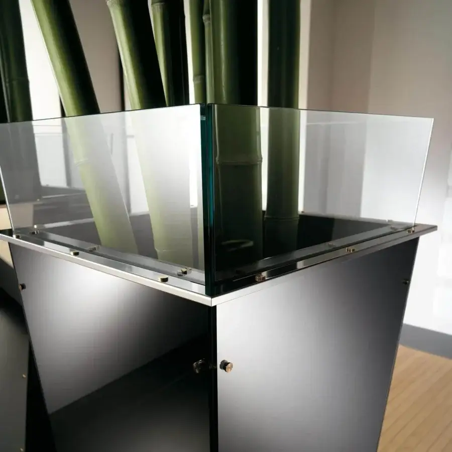 Exceptional Tonelli Design Amon planter crafted in black lacquered glass with stainless steel screws for contemporary interiors