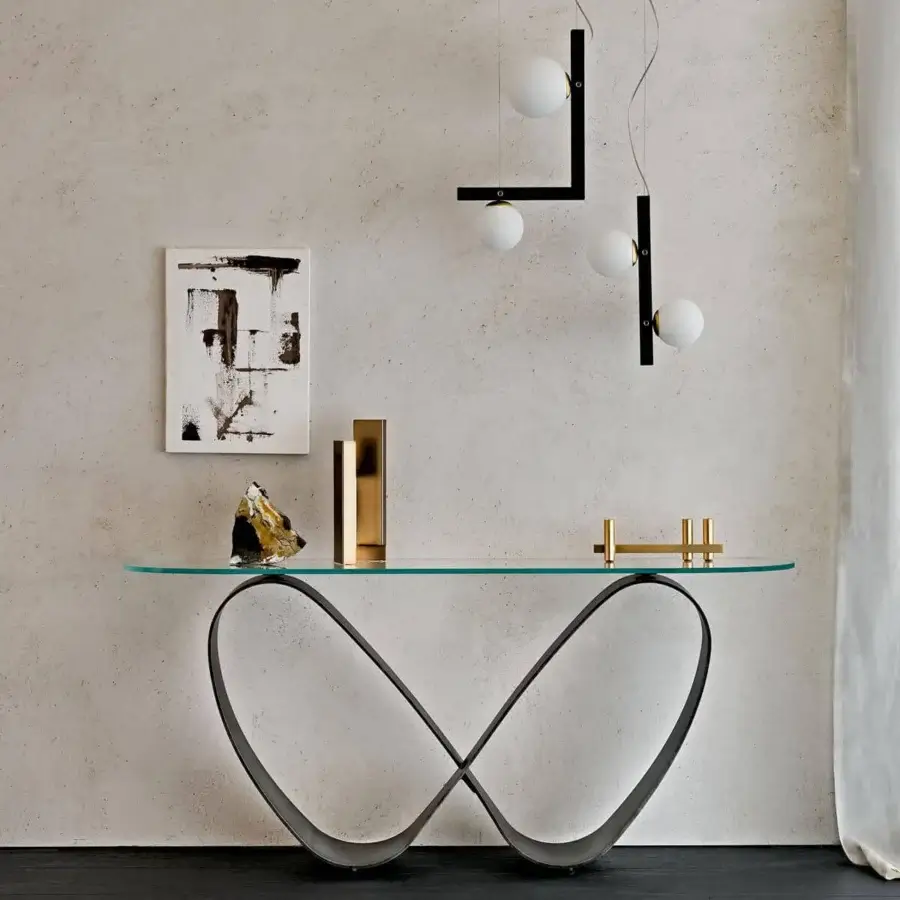Exceptional Cattelan Italia Butterfly console with clear glass top and titanium embossed lacquered steel base in a dark matte finish