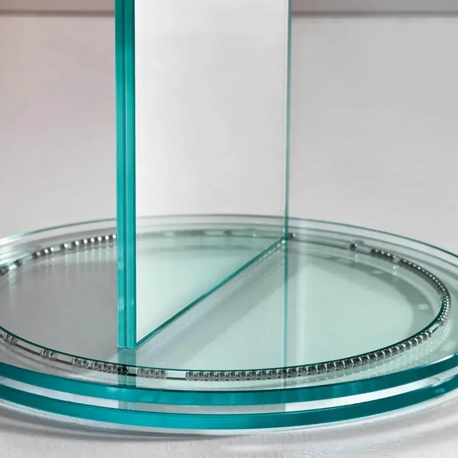 Innovative Tonelli Design Soglia mirror with intersecting vertical glass panels and patented revolving base