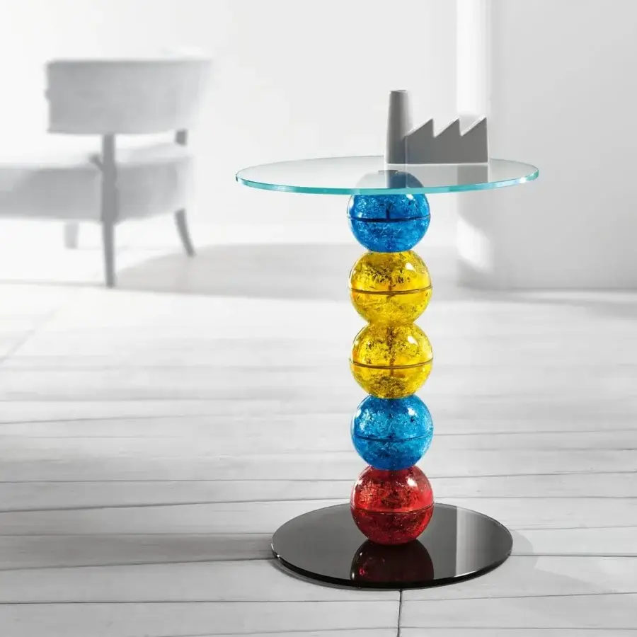 Exclusive Tonelli Design Il Paese delle Meraviglie side table crafted with vibrant blue, yellow, and red glass fragments and a clear glass tabletop