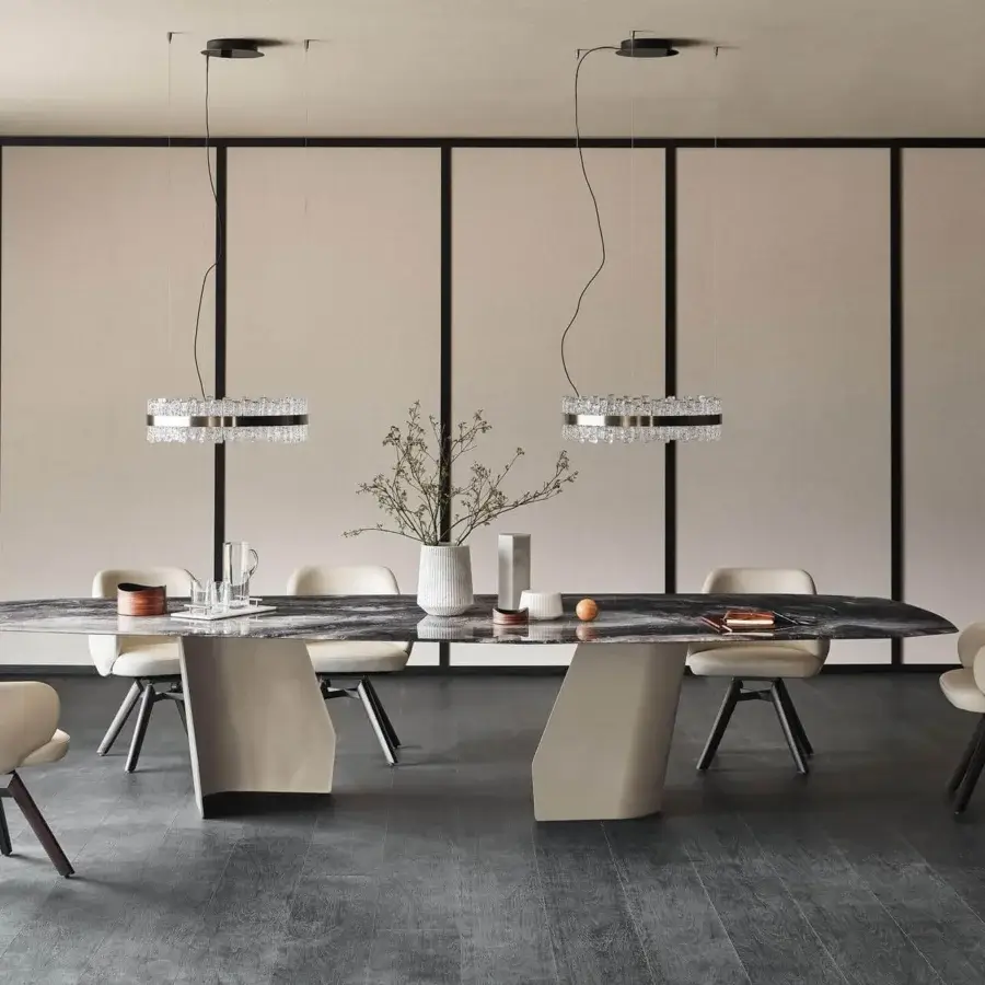Elegant Cattelan Italia Senator table with cool gray and white marble-effect glass and light beige trapezoidal bases