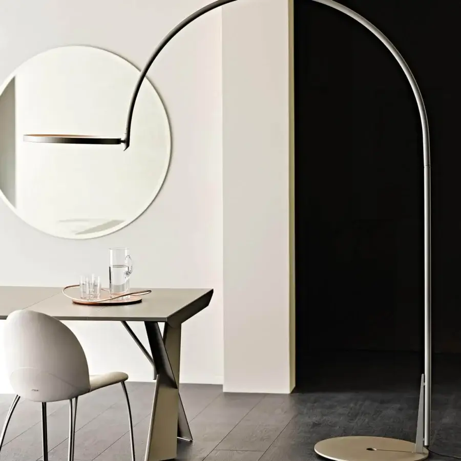 Distinctive Cattelan Italia Arx floor lamp with curved light gray embossed lacquered steel structure and round base