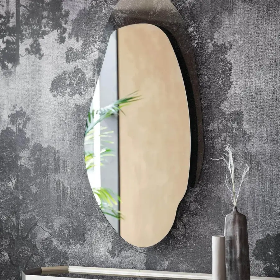 Elegant Cattelan Italia Akumal mirror crafted in fumé glass with a sinuous, freeform silhouette and fumé glass frame