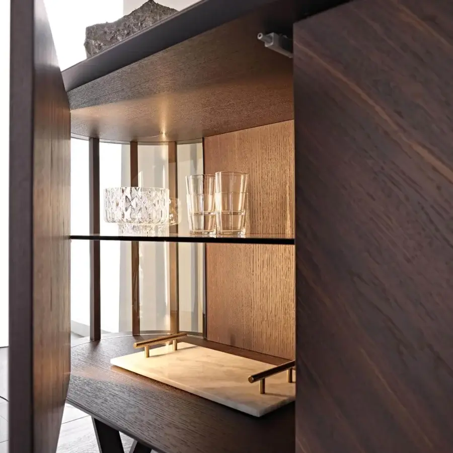 Distinguished Cattelan Italia Costes sideboard with Canaletto walnut and fumé glass shelves, built with a lacquered steel base and curved transparent sides