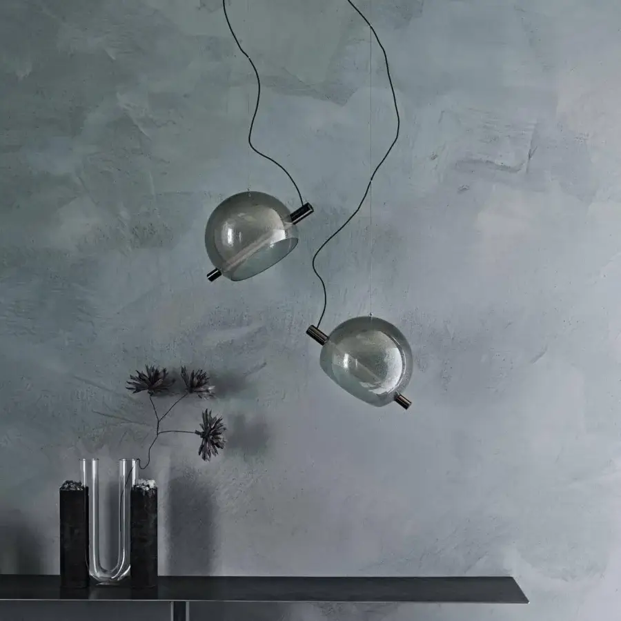Distinguished Cattelan Italia Cody suspension lamp with artistic blown transparent glass and black chrome steel accents