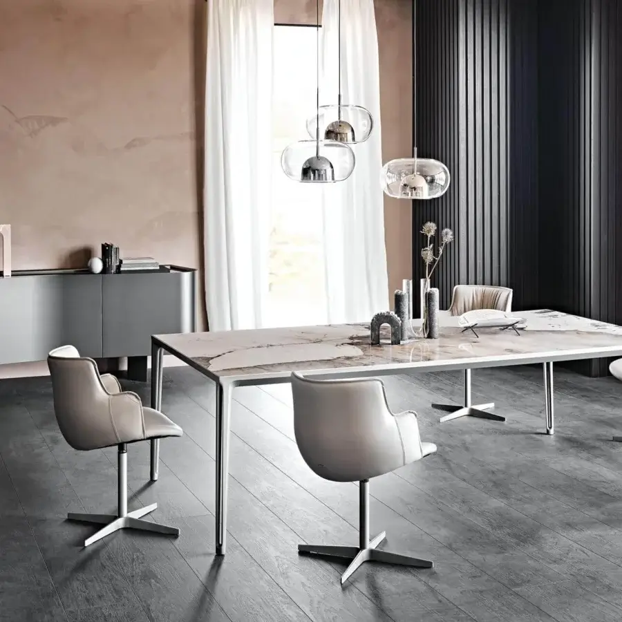 Distinguished Cattelan Italia Coimbra suspension lamp with a transparent glass sphere and glossy bronze interior component
