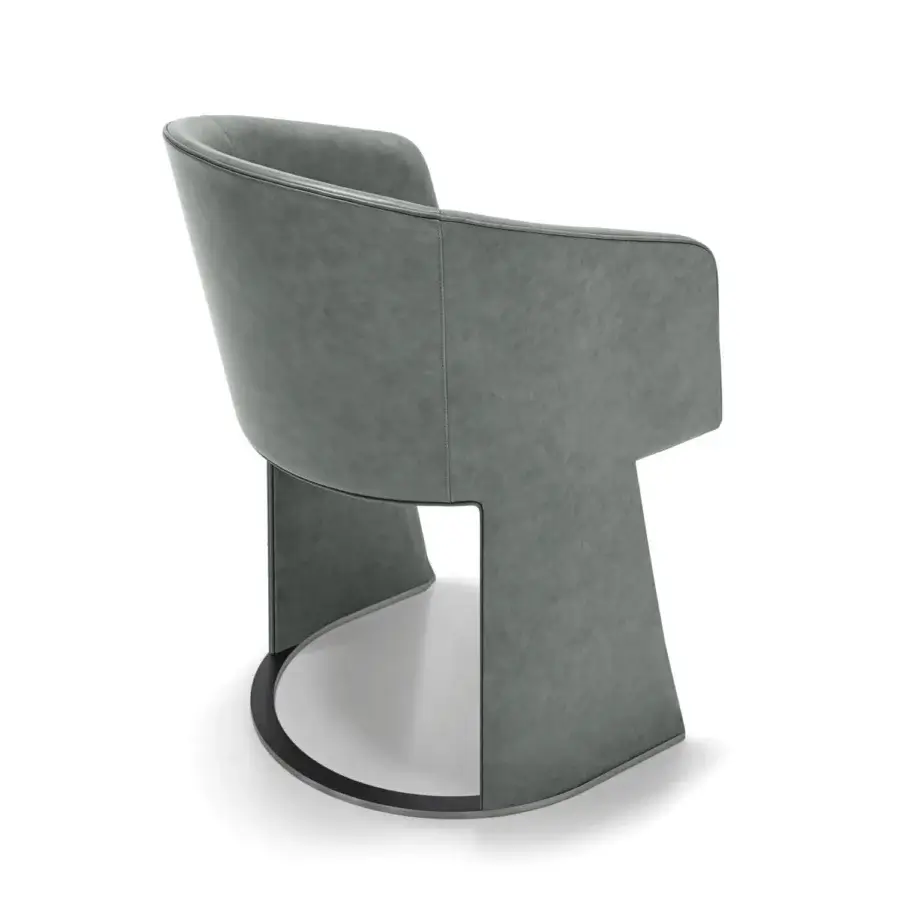 Sophisticated Arketipo Numa armchair with curved silhouette upholstered in textured matte gray textile and brushed steel base