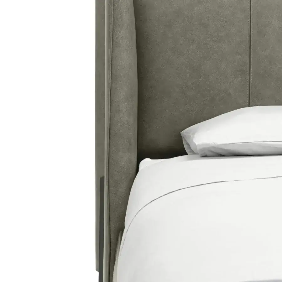 Distinguished Arketipo Big Night bed with gray textile upholstery and a unique folded headboard secured with metal clasps