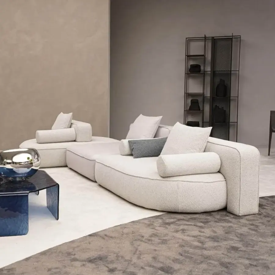 Innovative Arketipo Back Pack sectional with light beige textured textile upholstery and subtle piping