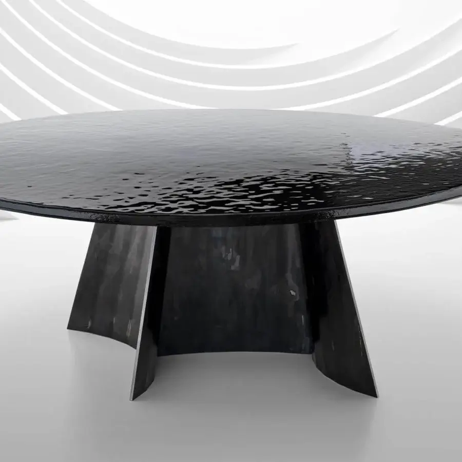 Avant-garde Arketipo Avalon table with an annealed glass dreamscape and a winding dark metal base crafted in Italy