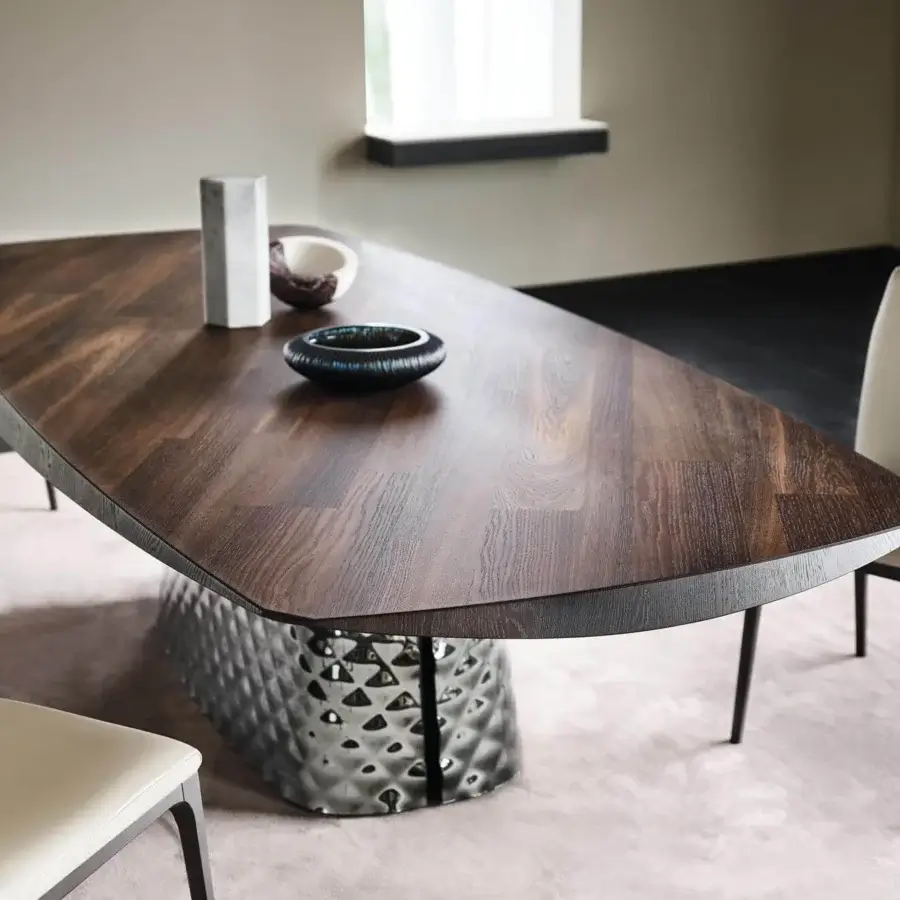 Sophisticated Cattelan Italia Atrium Wood table with boat-shaped top crafted from diagonally arranged planks of burned oak and visible grain