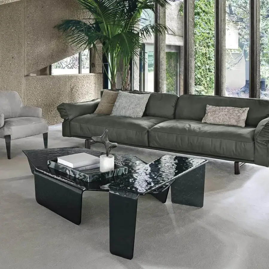 Exceptional Arketipo Close to Me sofa with dark greenish-gray cushions and sculpted elliptical feet crafted in leather