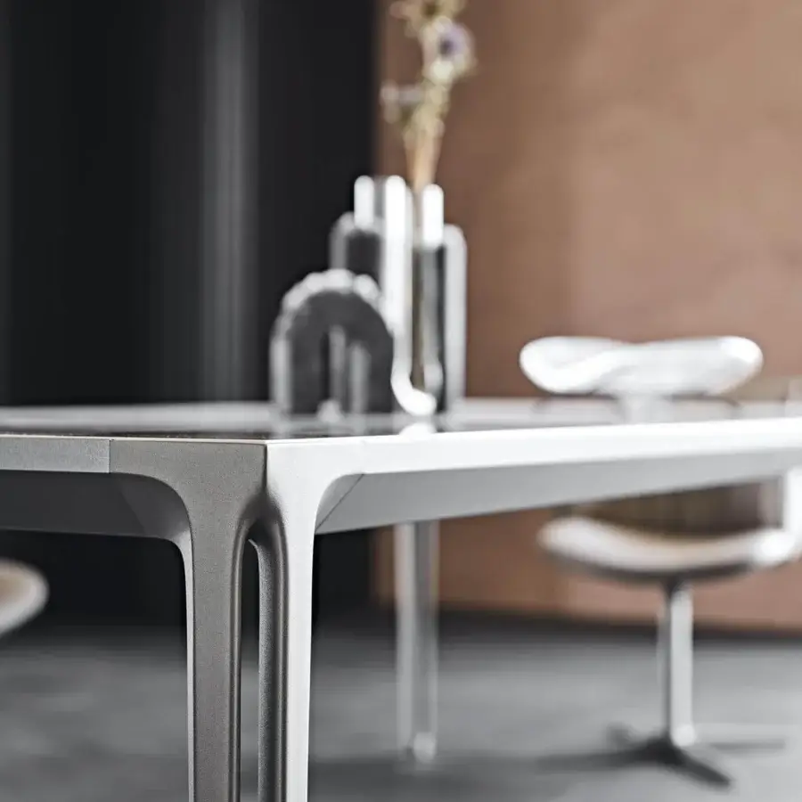 Distinguished Cattelan Italia Boulevard table with a light grey ceramic Marmi top and embossed lacquered aluminum legs