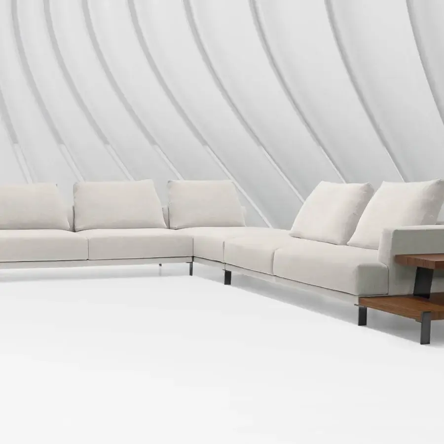 Luxury Arketipo That's Life sectional in light beige upholstery with dark metal legs and attached wooden side tables