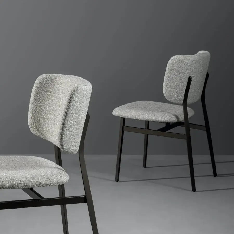 Distinguished Bonaldo Noor chair with light gray woven textile upholstery and dark matte steel structure