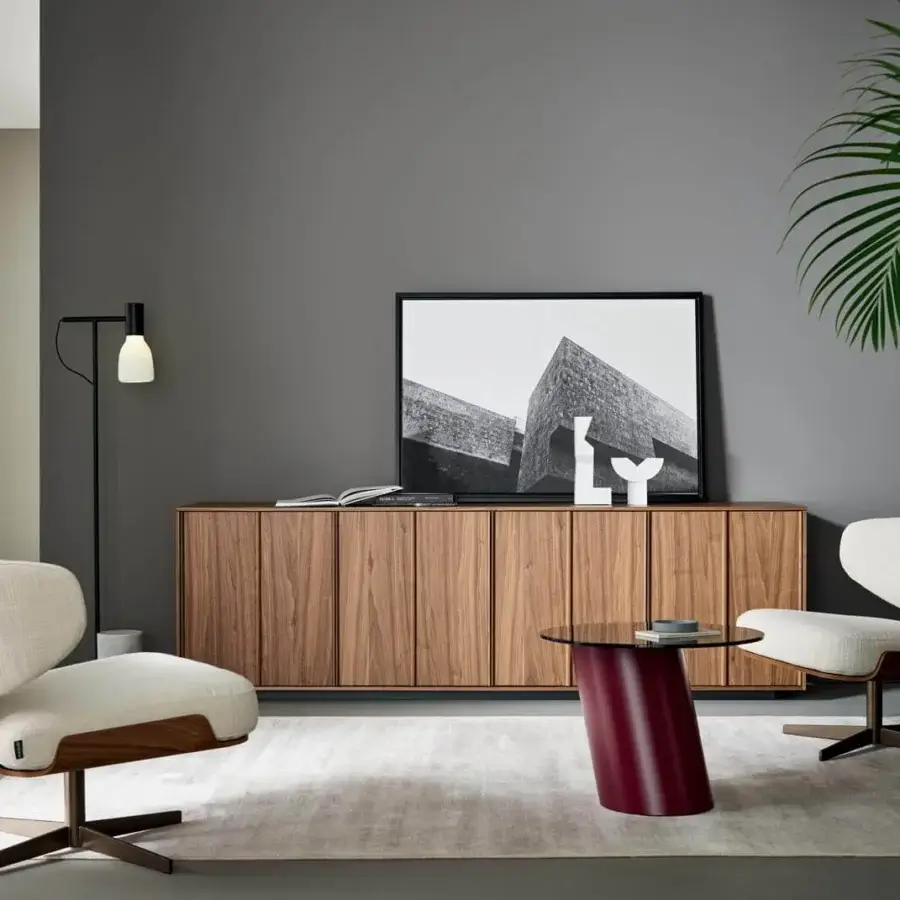 Exceptional Bonaldo Olos lounge chair with sinuous design, curved wood and dark satin metal base with textile upholstery