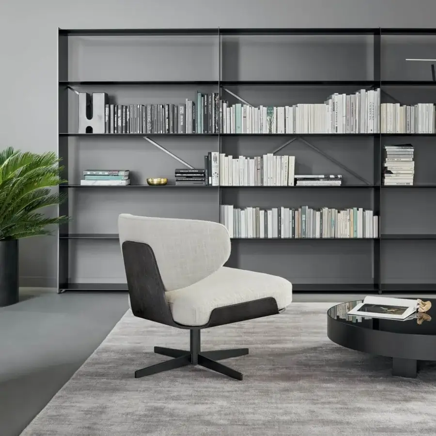 Distinguished Bonaldo Olos lounge chair with light beige textile and dark-toned curved wood crafted with a matte black metal base