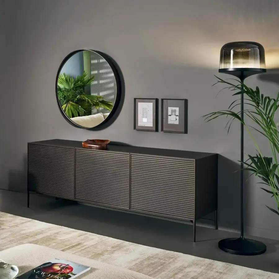 Superior Bonaldo Adone mirror with a circular design and slim dark metal frame enhancing scenic interiors