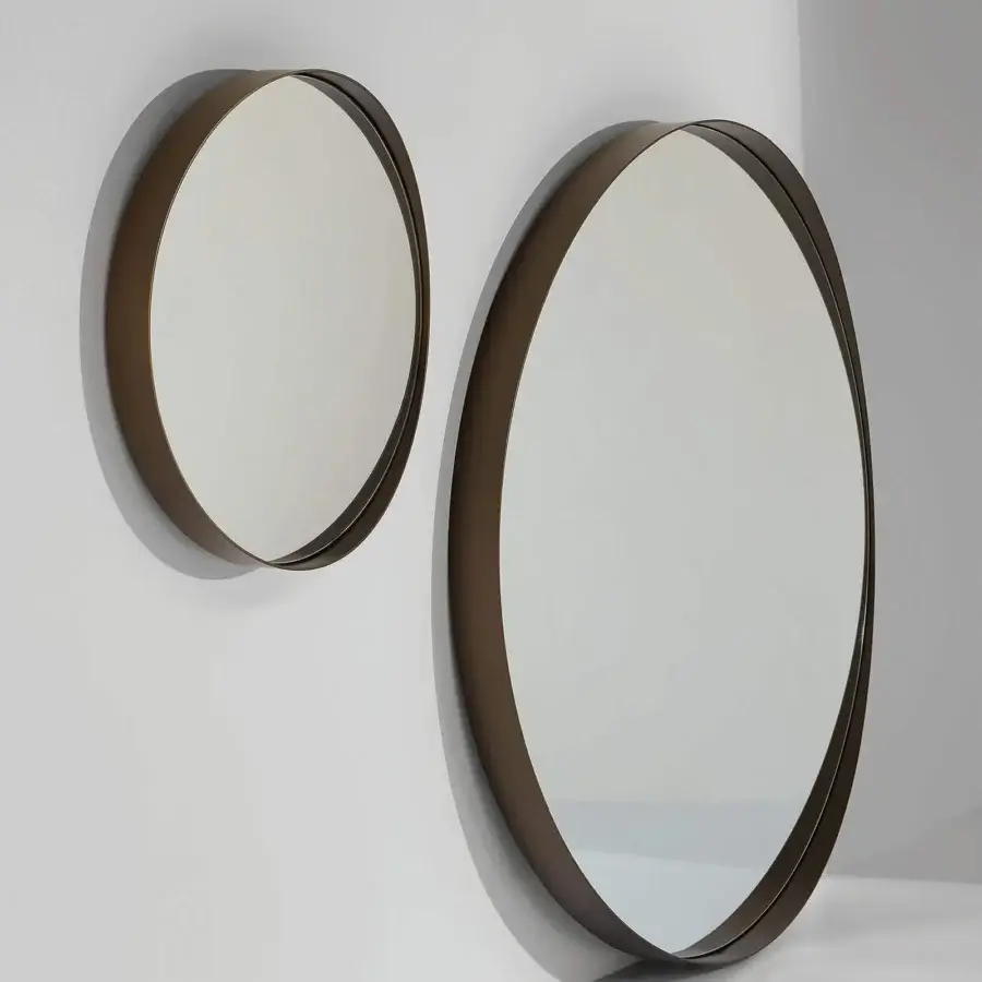 Distinguished Bonaldo Adone mirror crafted in Italy with a round silhouette and slim dark bronze matte metal frame