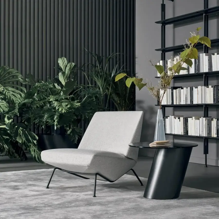 Superior Bonaldo Sleek Lounge Chair with light gray fabric upholstery and a dark metal frame built with circular feet