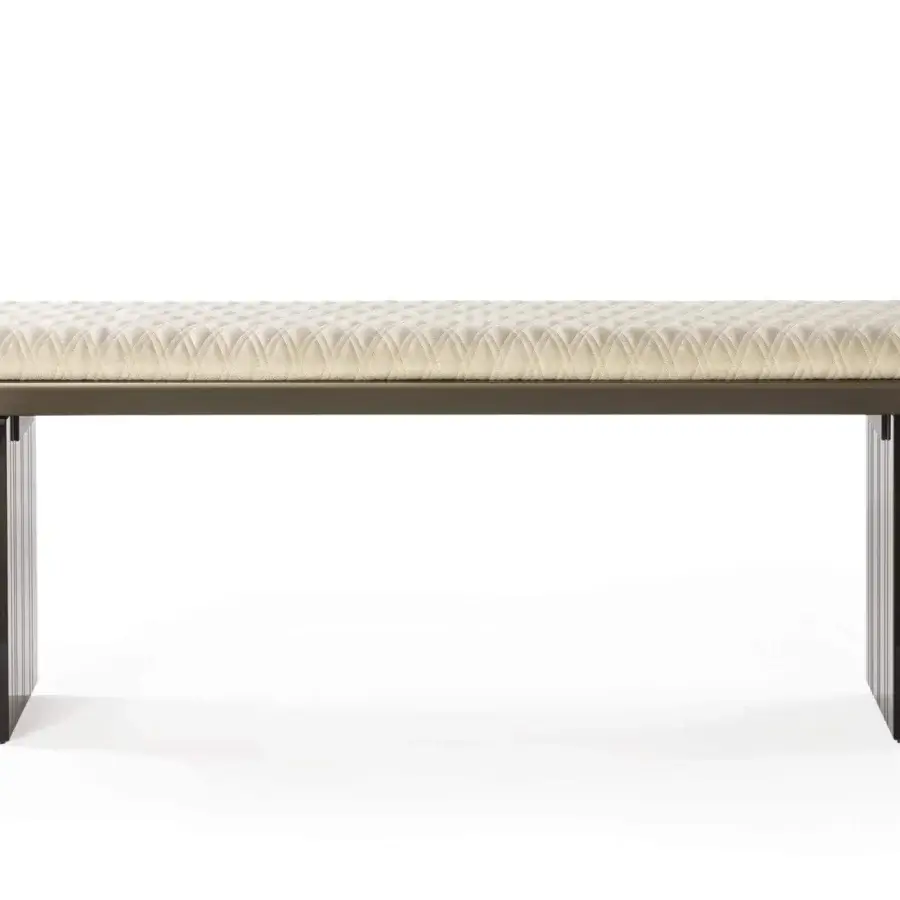 Distinctive Reflex Monolite bench with quilted light cream fabric seat and dark-toned glass legs built with bronze lacquered wood