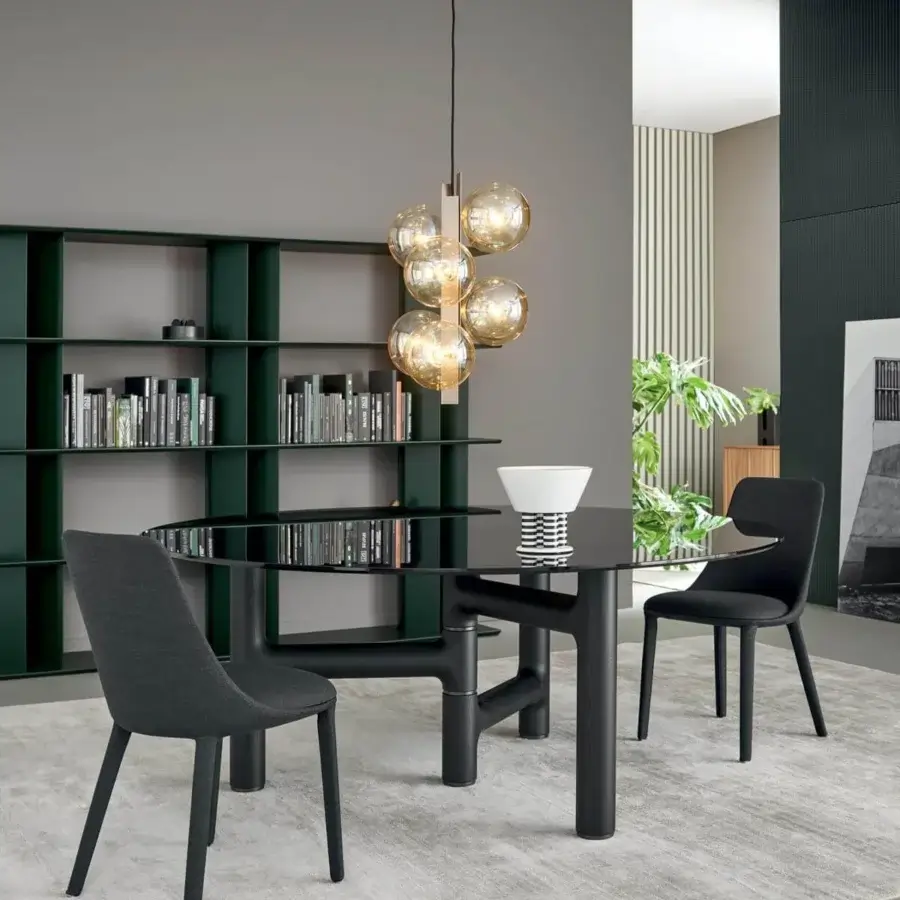 Exceptional Bonaldo Pivot table with asymmetric geometric base in solid wood and refined metal, supporting a sleek round black glass top
