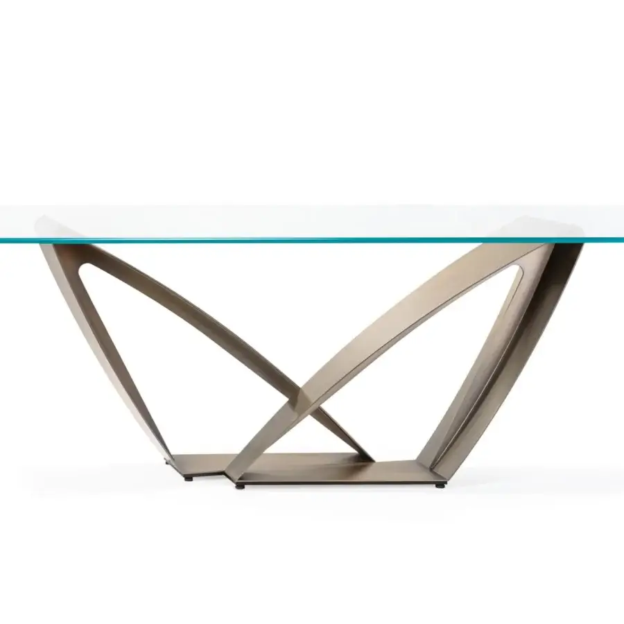 Exceptional Reflex Apeiron table with transparent glass top and curved iron elements in a muted bronze finish