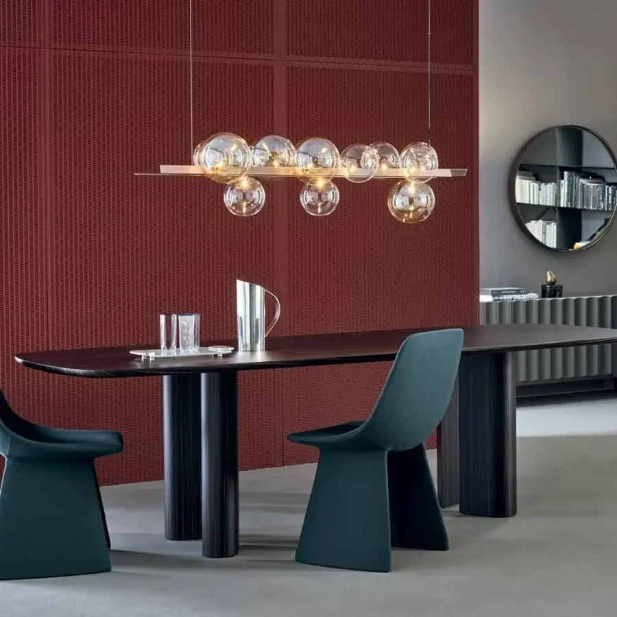 Innovative Bonaldo Geometric table with dark brown wood top and geometrically intriguing ebony veneered wood legs built with metal profile