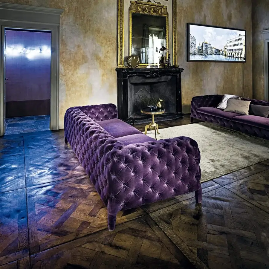 Distinguished Arketipo Windsor sofa crafted with plush velvet textile and deeply recessed button tufting in a saturated purple tone
