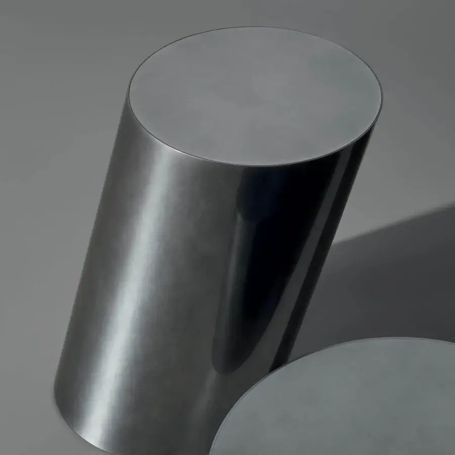 Superior Bonaldo Pisa coffee table with cylindrical form and medium gray leaning metal base exhibiting formal simplicity
