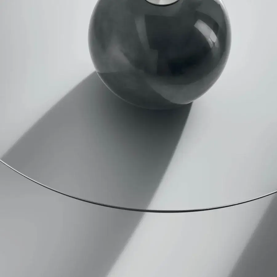 Elegant Bonaldo Circus coffee table with a dark gray metal base and refined silver metallic disc finish