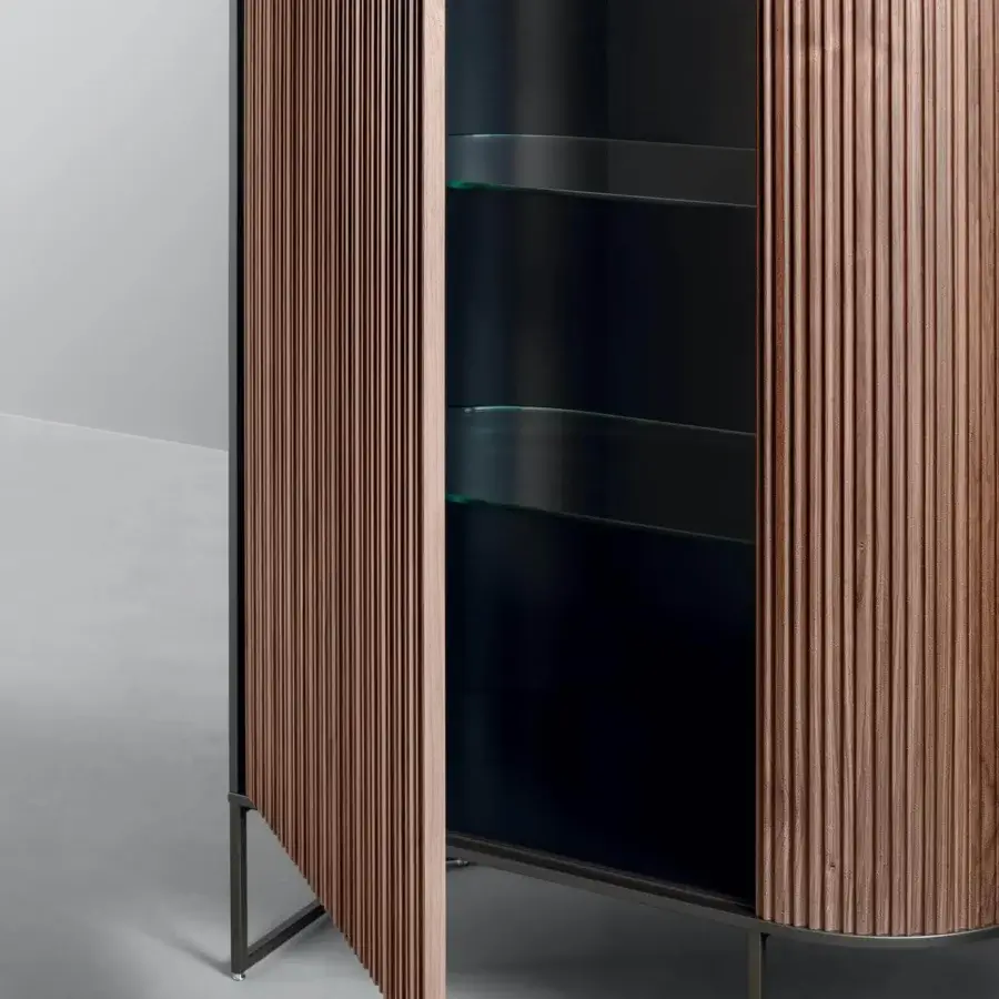 Elegant Bonaldo Dune cupboard with vertically ridged wooden front doors and dark grey melamine internal structure in a warm brown matte finish