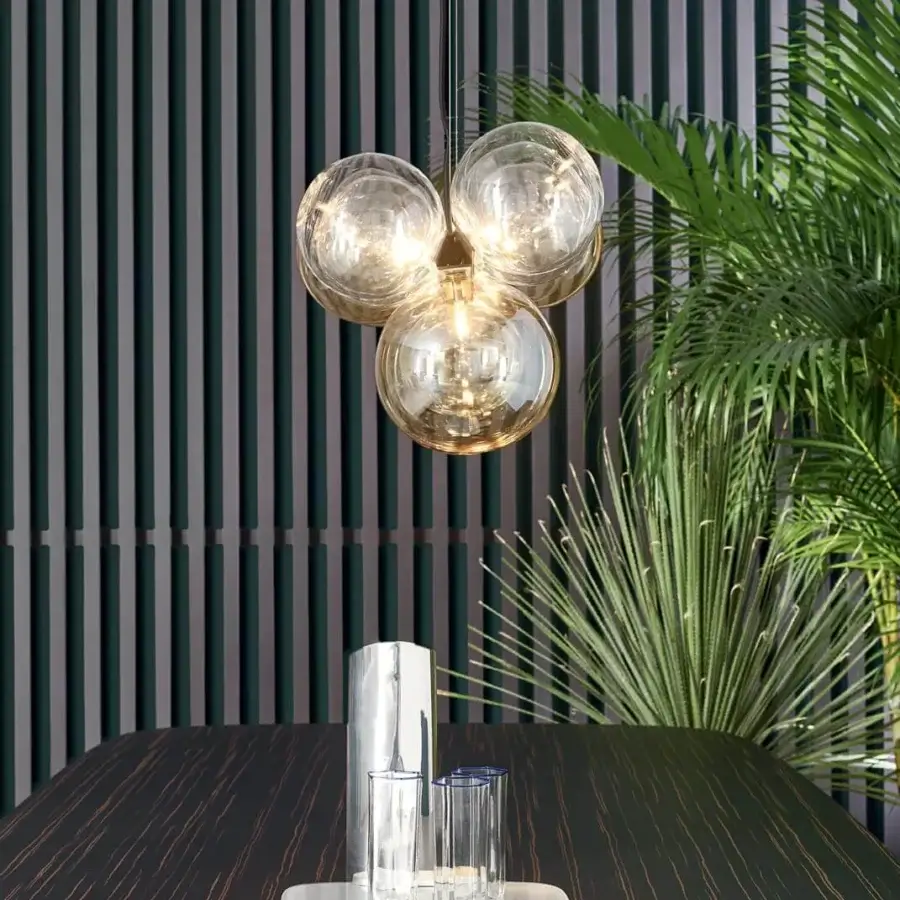Sophisticated Bonaldo Bon Ton suspension lamp with eleven glass lampshades in amber and transparent tones supported by slender metal cables