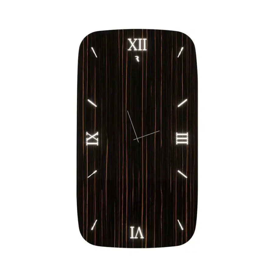Distinguished Reflex Nautilus clock with Wood Glass structure, titanium hands and illuminated white sandblasted Roman numerals crafted in Italy
