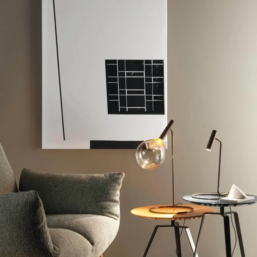Distinguished Bonaldo Sofi table lamp with warm amber borosilicate glass and burnished brass cylinder construction