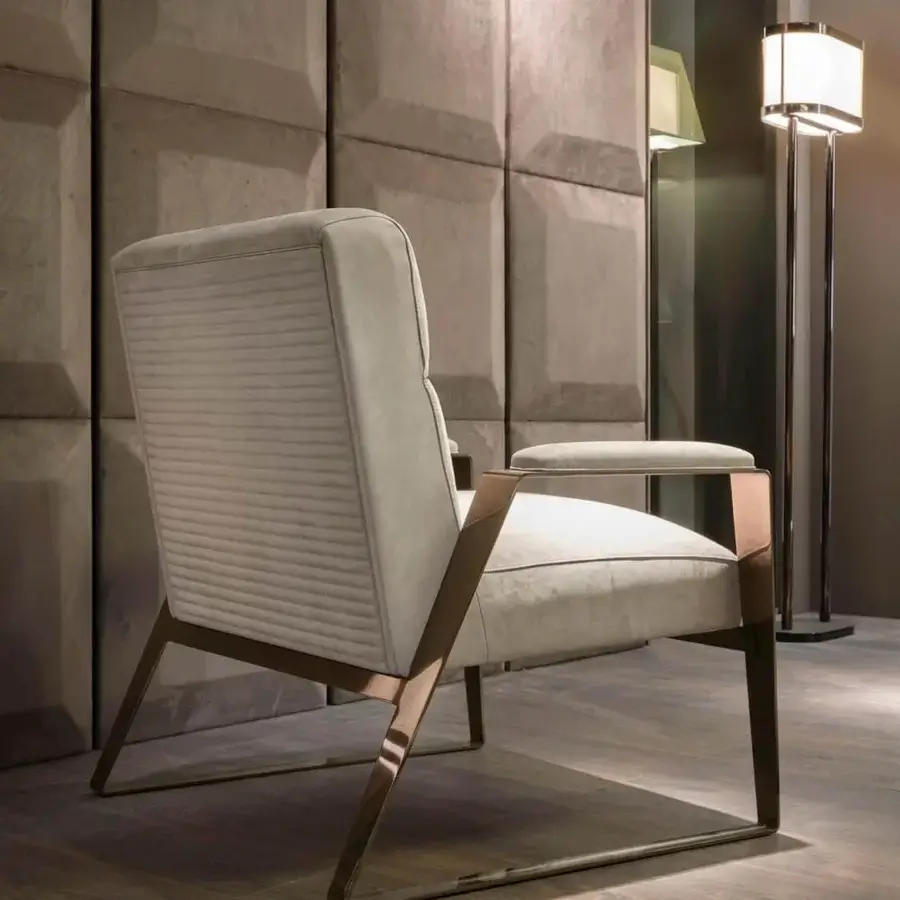 Distinguished DV Home Collection Hollywood lounge chair crafted with light beige upholstery and bronze-toned metal frame