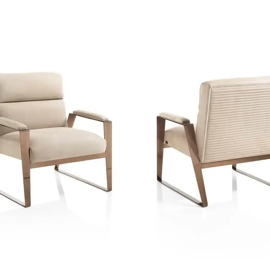 Exceptional DV Home Collection Hollywood lounge chair upholstered in soft beige textile with satin metal legs