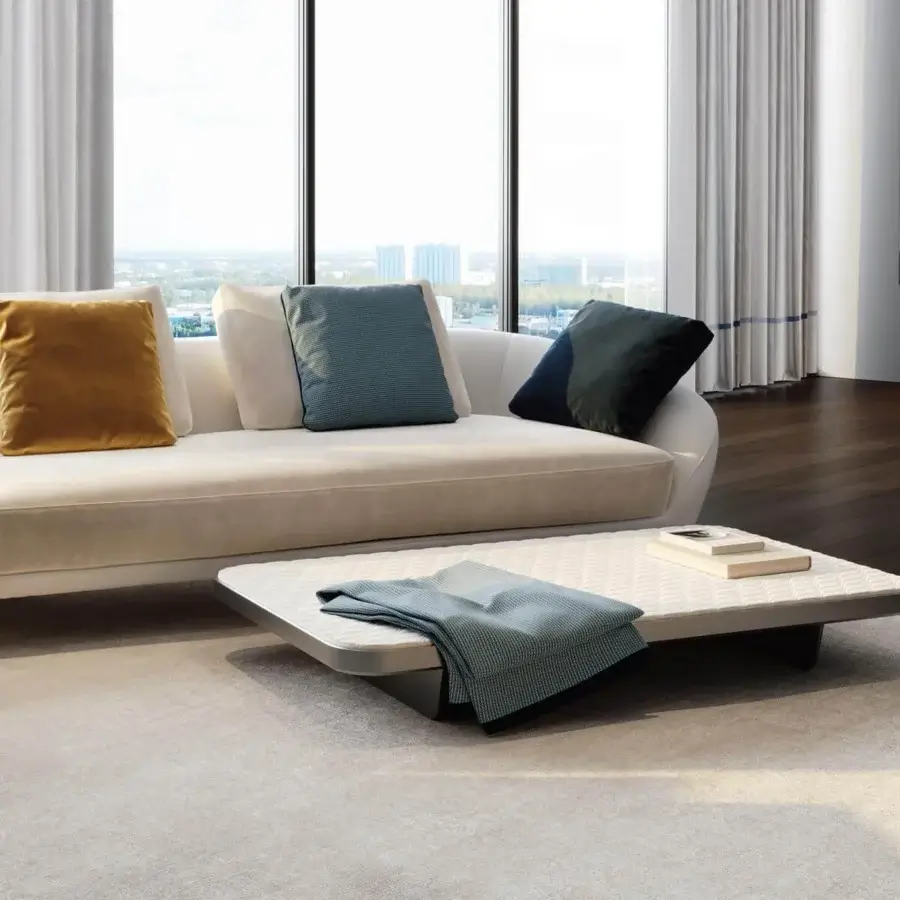 Refined Reflex Segno coffee table with light-textured leather tabletop and exclusive Segno quilting in dark gray metal legs