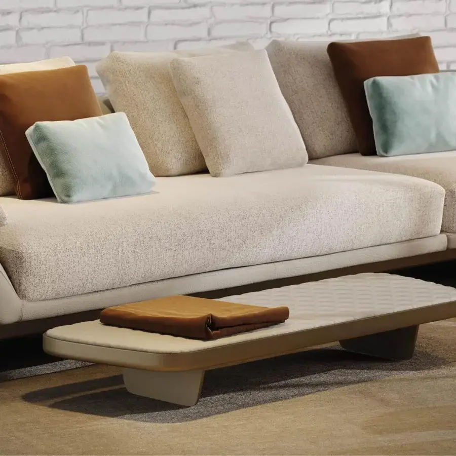 Exclusive Reflex Segno coffee table in light beige with quilted leather tabletop and sleek metal legs with elegant finishes