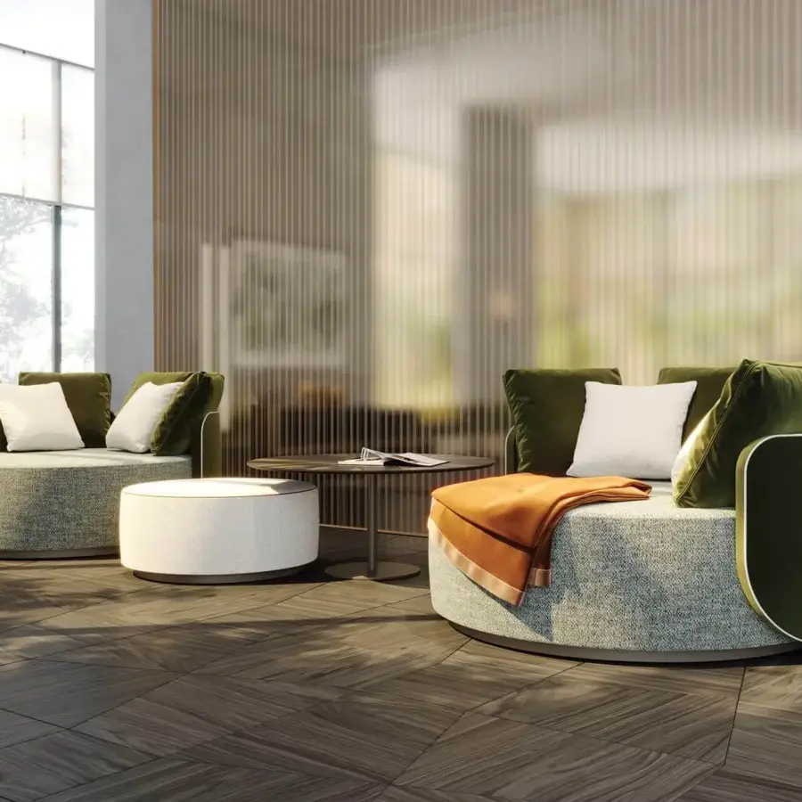 Superior Reflex Rondo coffee table with round Marble Glass top and sleek metal pedestal base in a dark matte finish