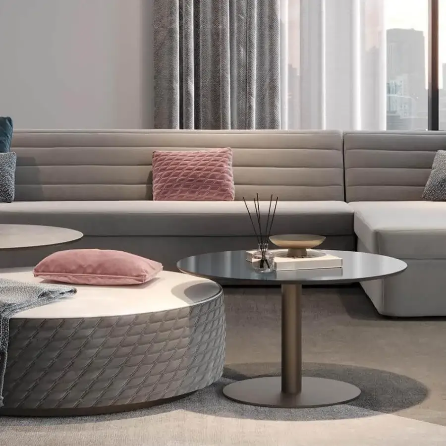 Exceptional Reflex Rondo coffee table with round tabletop and quilted gray textile cylindrical base crafted in Italy