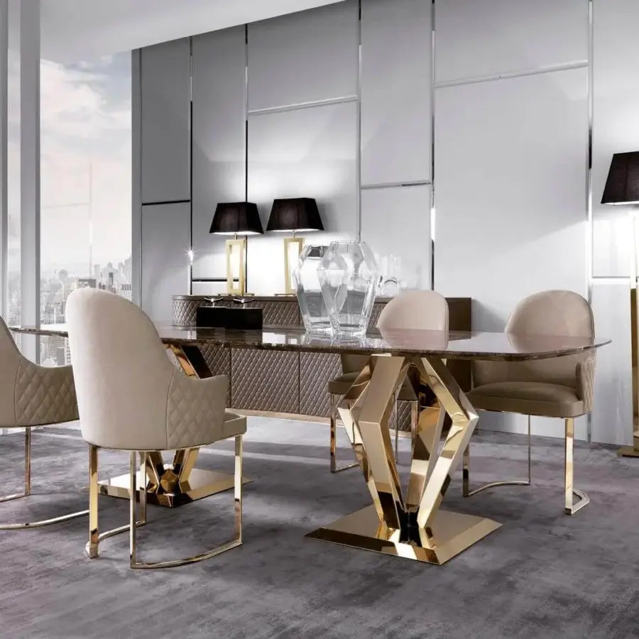Exclusive DV Home Collection Deco armchair with light beige quilted textile upholstery and glossy golden steel base