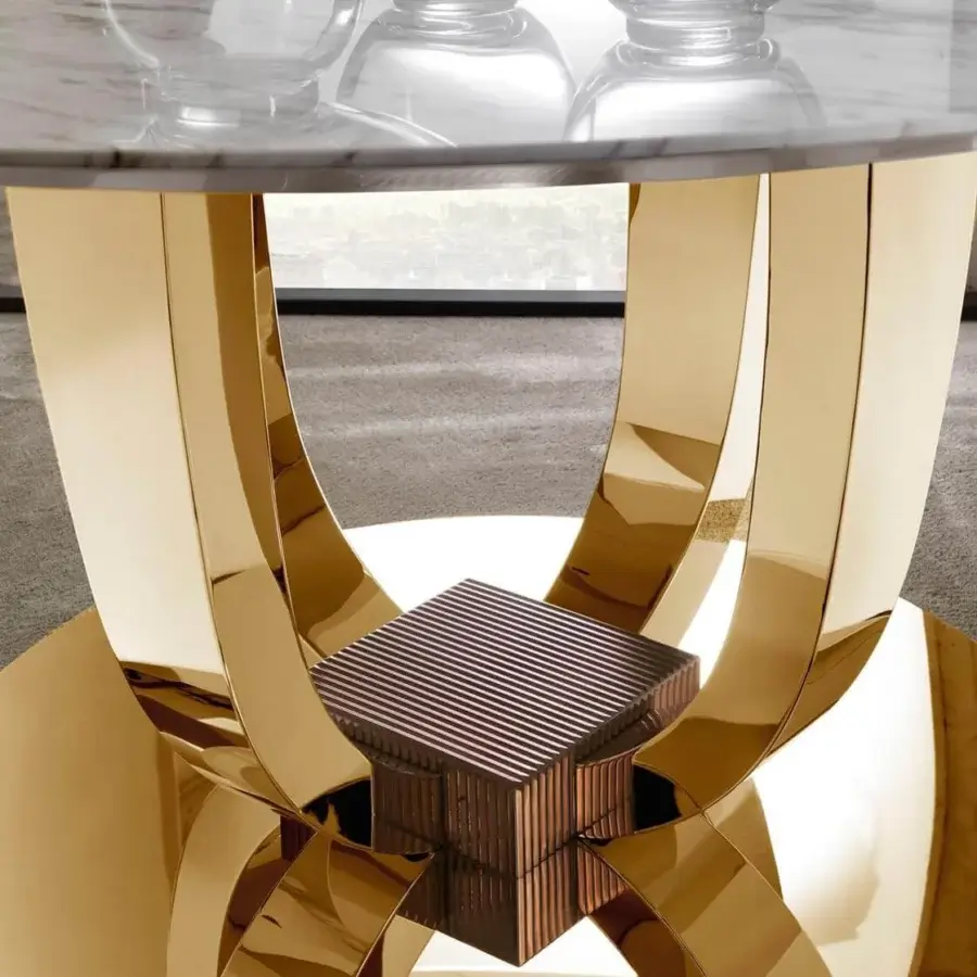 Exceptional DV Home Collection Hermes table with glossy marble tabletop and reflective gold stainless steel base