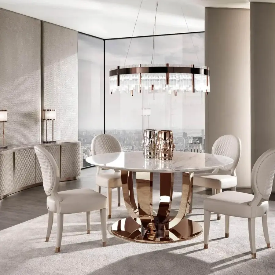 Lavish DV Home Collection Hermes table with light beige marble top and golden-copper glossy stainless steel base