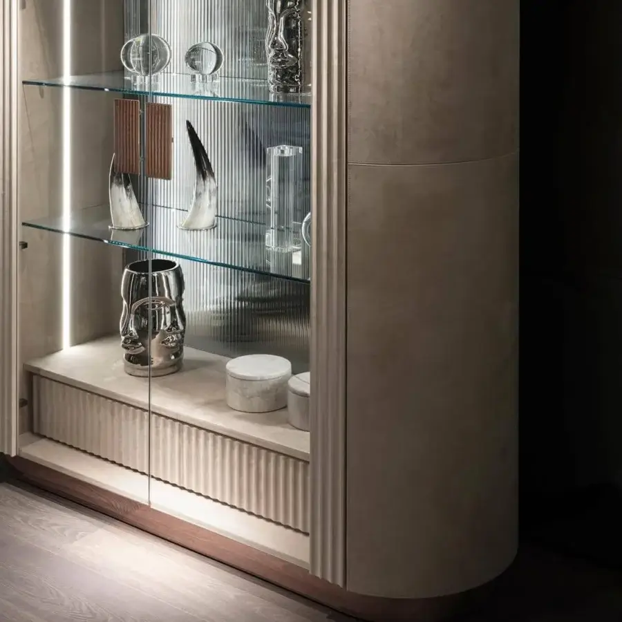 Distinguished DV Home Collection Hollywood Showcase cabinet with matt lacquered wood and steel edges, accented by Canneté finish and integrated lighting