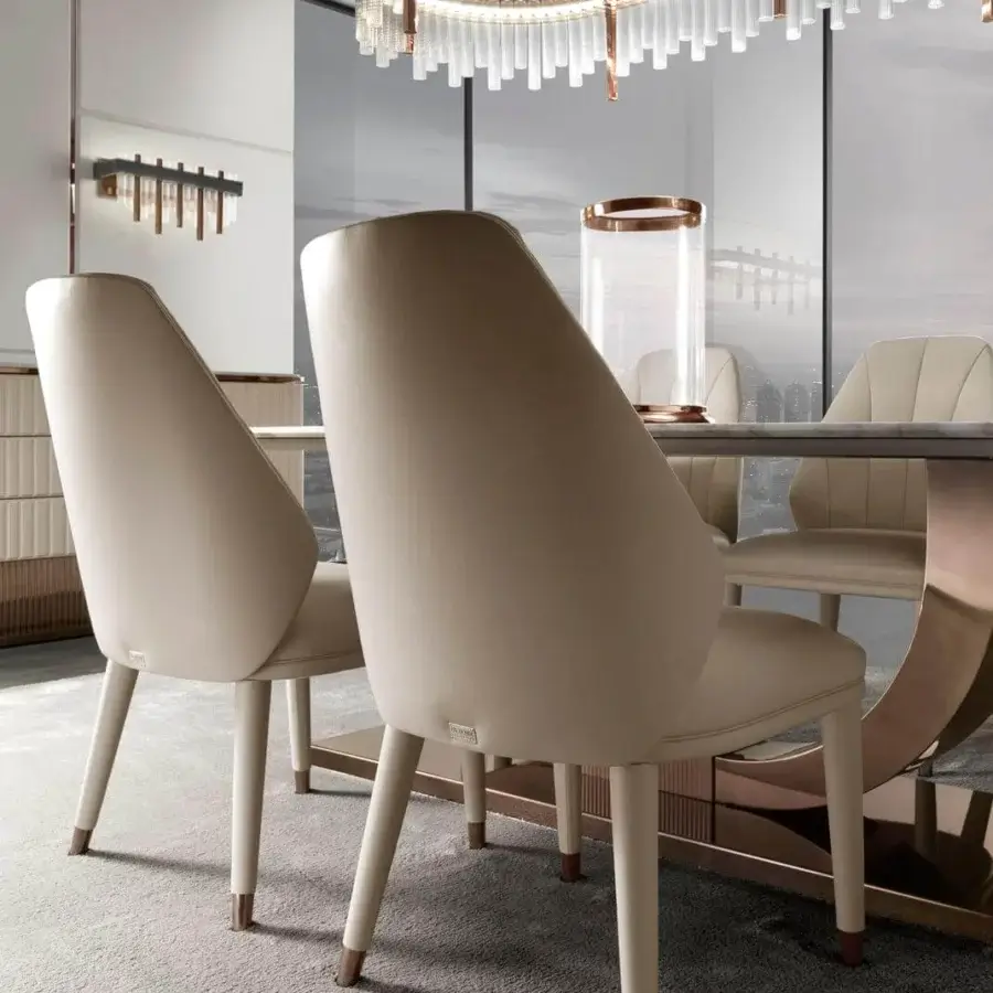 Elite DV Home Collection chair with light beige textile upholstery and glossy varnished solid wood legs with copper accents